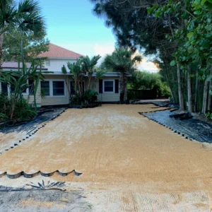 Sandy driveway base at tropical residence